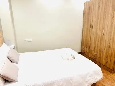 Cama o camas de una habitación en Plaza de Andalucía Home con parking