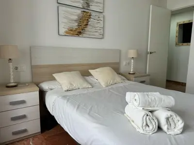 Cama o camas de una habitación en Apartamento La Bodega con PARKING GRATUITO