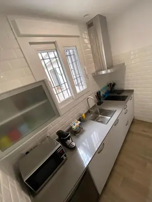 Una cocina o zona de cocina en SUITES DEL MAR y SUITE DE CÓRDOBA - Apartmentos en pleno centro