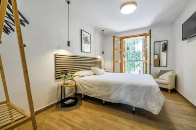 Cama o camas de una habitación en Casa Los Naranjos - Terraza en el Casco Histórico