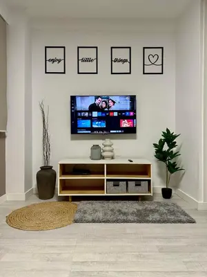Una televisión o centro de entretenimiento en Céntrico rincón de ensueño con opción a PARKING