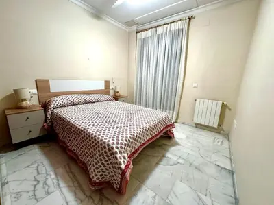Cama o camas de una habitación en Apartamento en PLENO CENTRO con APARCAMIENTO opcional