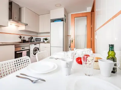 Una cocina o zona de cocina en Apt buenas calidades La Algaba Bazan