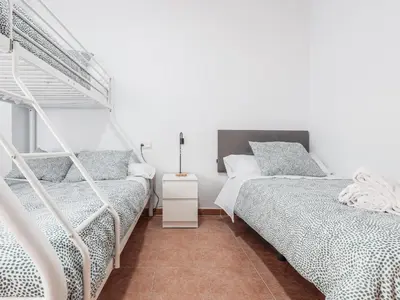 Cama o camas de una habitación en Apt buenas calidades La Algaba Bazan
