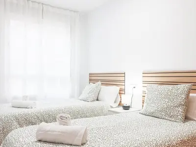 Cama o camas de una habitación en Apt buenas calidades La Algaba Bazan