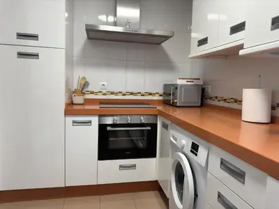 Una cocina o zona de cocina en Dúplex céntrico con terraza y parking gratuito