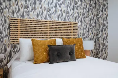 Cama o camas de una habitación en Wish Suite Miraflores de Sevilla