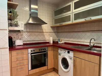 Una cocina o zona de cocina en RgHOST-Apartamento La Palma en Casco Histórico