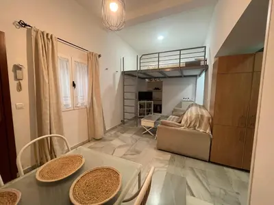 Cama o camas de una habitación en RgHOST-Apartamento La Palma en Casco Histórico