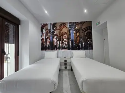 Cama o camas de una habitación en Nueva PENSION CIBELES