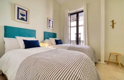 Cama o camas de una habitación en Atico con terraza privada Centro Histórico