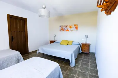 Cama o camas de una habitación en Cortijo LaGar