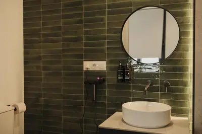 Un baño de PALOMA SUITES