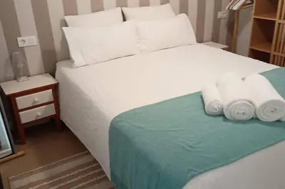 Cama o camas de una habitación en Bonito, céntrico y fresco apartamento Santa Marina