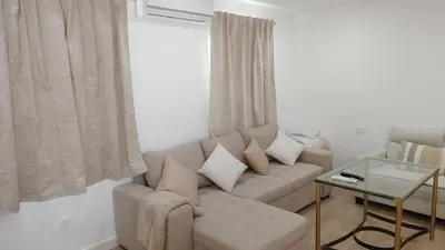 Zona de estar de Bonito, céntrico y fresco apartamento Santa Marina