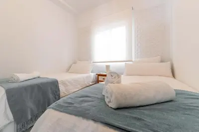 Cama o camas de una habitación en Precioso apartamento junto a la Mezquita.