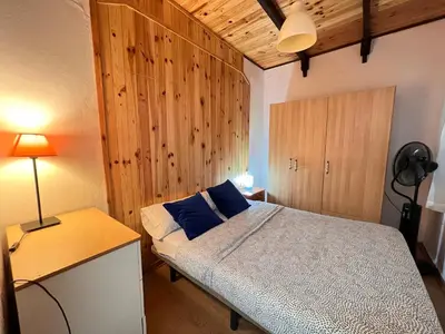 Cama o camas de una habitación en Somos Sevilla Private Apartments