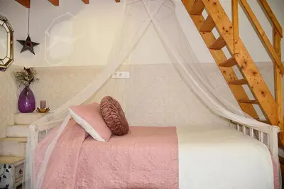 Cama o camas de una habitación en Casa de la Judería Doña Pilar