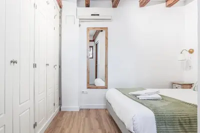 Cama o camas de una habitación en Bonito duplex con terraza calle Féria