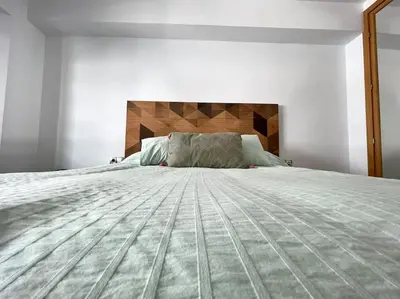 Cama o camas de una habitación en Apartamento céntrico urbano con terraza