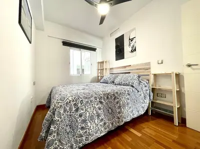 Cama o camas de una habitación en Apartamento céntrico urbano con terraza