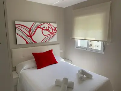 Cama o camas de una habitación en Ritual Sevilla, Fedriani