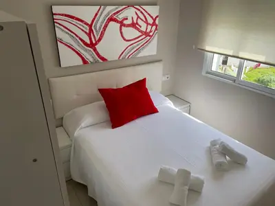 Cama o camas de una habitación en Ritual Sevilla, Fedriani