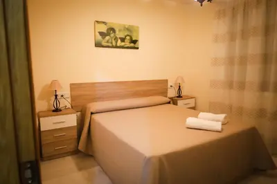 Cama o camas de una habitación en Hospedium DLJ Arjona Centro I