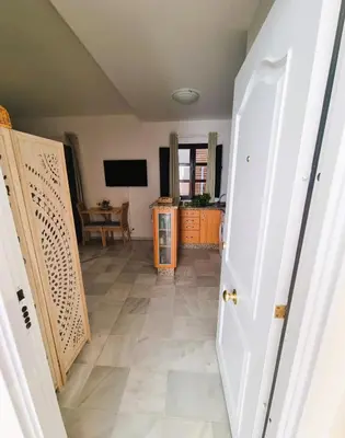 Una televisión o centro de entretenimiento en Estudio San Esteban