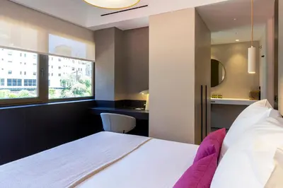 Cama o camas de una habitación en Feelathome Nervión Apartments