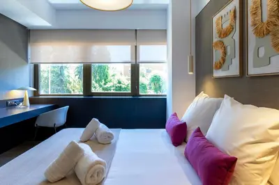 Cama o camas de una habitación en Feelathome Nervión Apartments