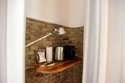 Una cocina o zona de cocina en RentalSevilla Lumbreras I