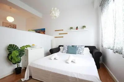 Cama o camas de una habitación en Nuevo estudio centro Sevilla. AC/WIFI Castellar 56