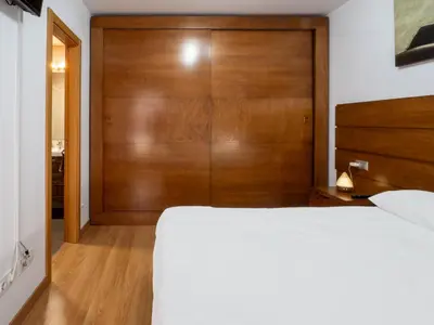 Cama o camas de una habitación en BHost - María Auxiliadora