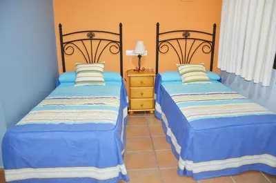 Cama o camas de una habitación en Hostal Restaurante El Parador