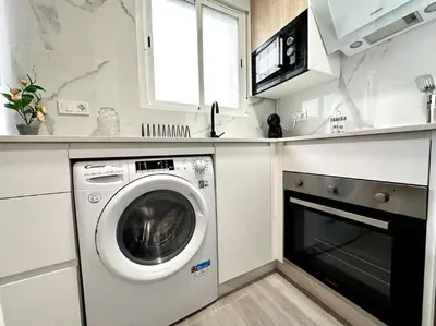 Una cocina o zona de cocina en Apartamentos Rincón Andaluz 4