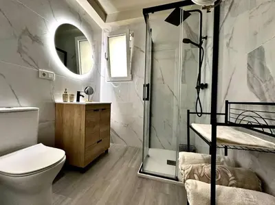 Un baño de Apartamentos Rincón Andaluz 4