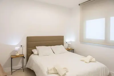 Cama o camas de una habitación en Royar Apartamentos