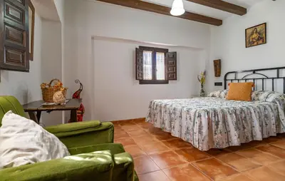 Cama o camas de una habitación en Cozy Home In Castillo De Locubin