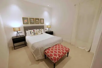 Cama o camas de una habitación en CoLet Apartamento