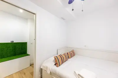 Cama o camas de una habitación en Jardinillos Bed & Parking