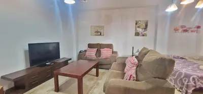 Una televisión o centro de entretenimiento en Juderia House in Cordoba