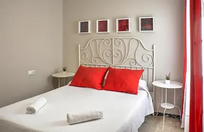 Cama o camas de una habitación en Ritual Sevilla, piedra preciosa