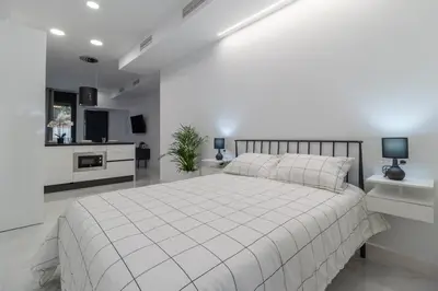 Cama o camas de una habitación en Loft DanielHome