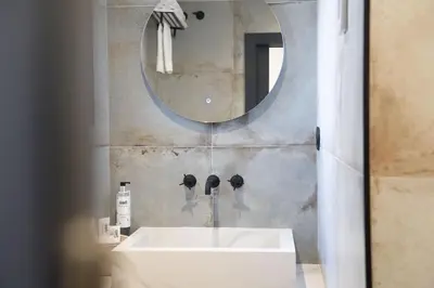 Un baño de Apartamentos MLC Ciudad de Linares