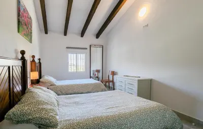 Cama o camas de una habitación en Nice Home In La Puebla De Los Infan