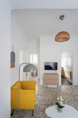 Una televisión o centro de entretenimiento en Ático ISPAL con Terraza en Centro