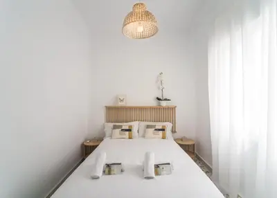 Cama o camas de una habitación en Ático ISPAL con Terraza en Centro