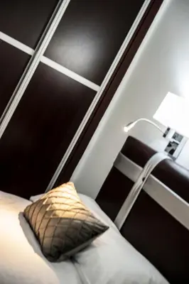 Cama o camas de una habitación en HOSTAL LAS PALOMAS