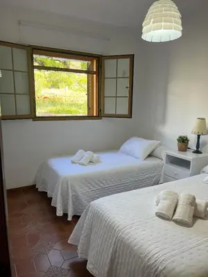 Cama o camas de una habitación en casa rural Hachuelo